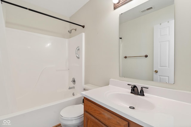 full bathroom with bathtub / shower combination, toilet, and vanity