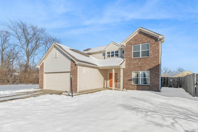 view of front of property with a garage