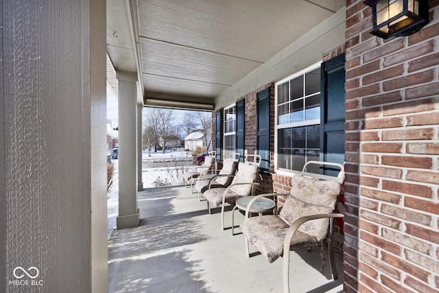 view of snow covered patio