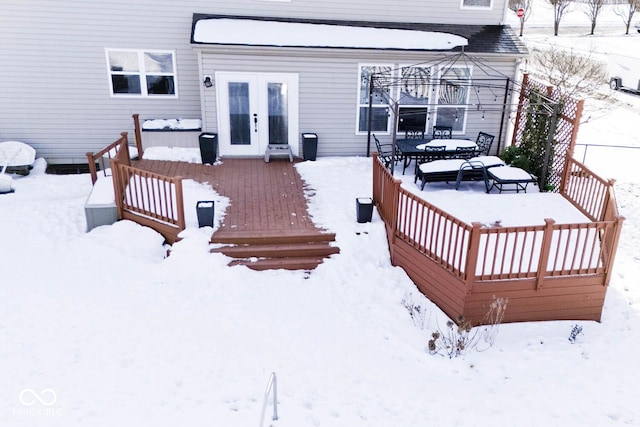 view of snow covered deck