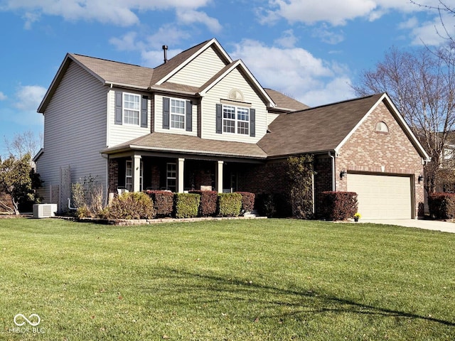 view of front of home with central AC unit, a front lawn, and a garage