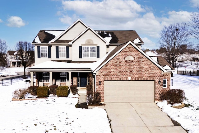 front facade featuring a porch and a garage