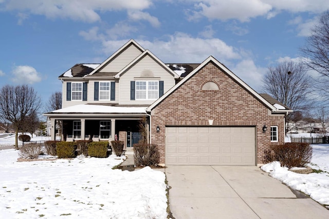 view of front property with a garage and a porch