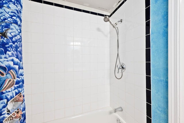 bathroom featuring shower / tub combo