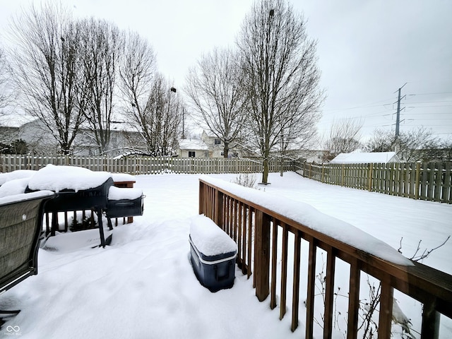 view of snow covered deck