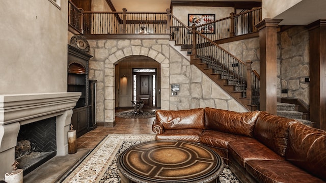 living room with a towering ceiling