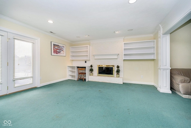 unfurnished living room with ornamental molding, carpet, a fireplace, and built in shelves