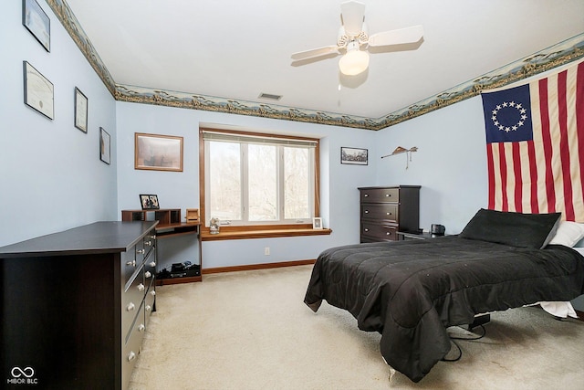 carpeted bedroom featuring ceiling fan