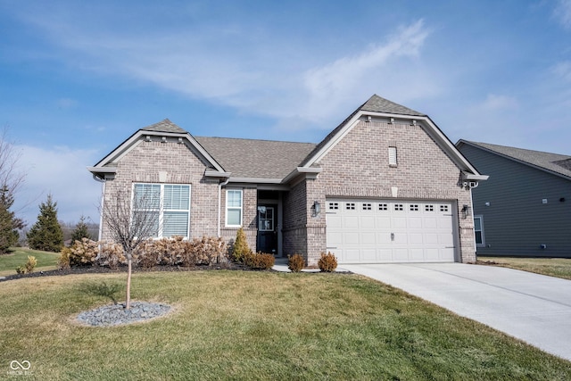 view of front facade featuring a garage and a front yard