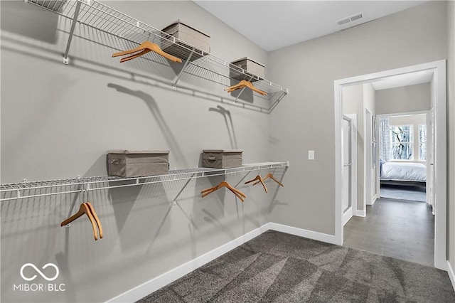 walk in closet featuring visible vents