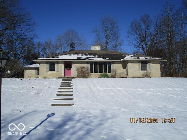 view of front of house with a chimney