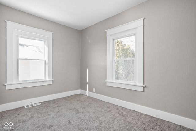 empty room with carpet floors