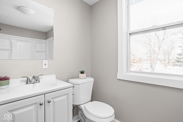 bathroom with vanity and toilet