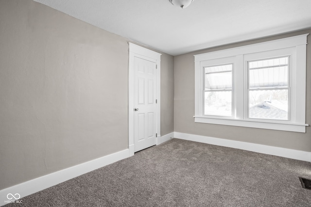 empty room with carpet floors