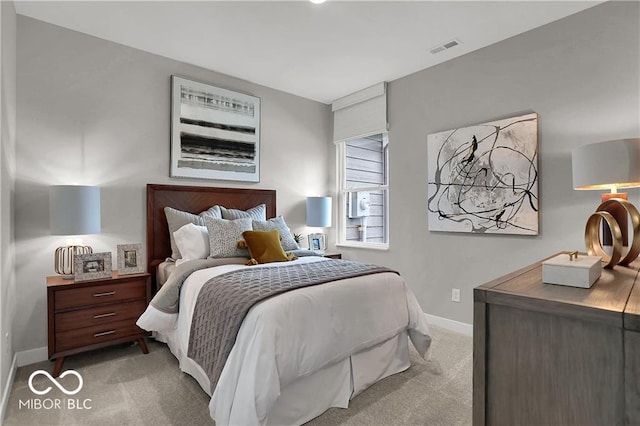 bedroom featuring carpet, visible vents, and baseboards