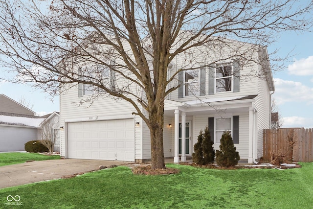 front facade featuring a garage and a front yard