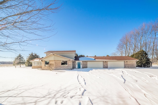 single story home featuring a garage