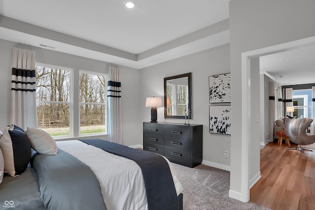 bedroom with recessed lighting, visible vents, and baseboards