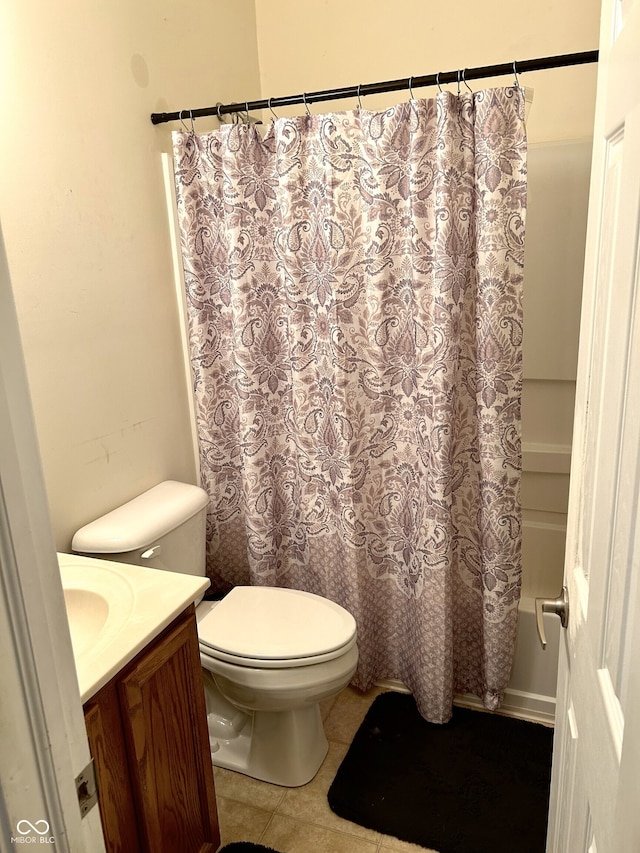 full bathroom with vanity, toilet, tile patterned flooring, and shower / bath combo