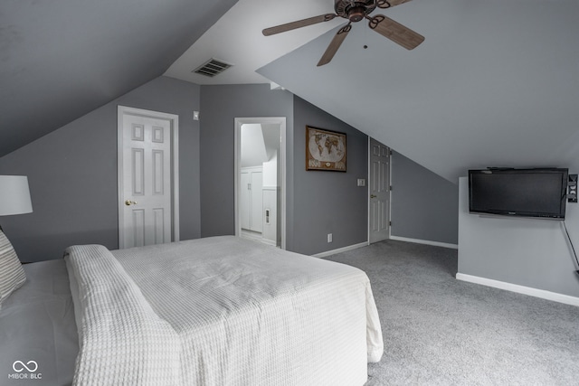 carpeted bedroom featuring vaulted ceiling and ceiling fan