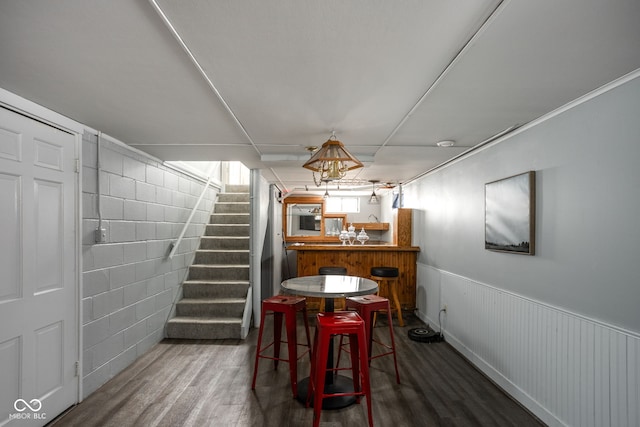 dining area with hardwood / wood-style floors