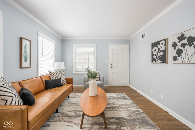 living room with ornamental molding and wood-type flooring