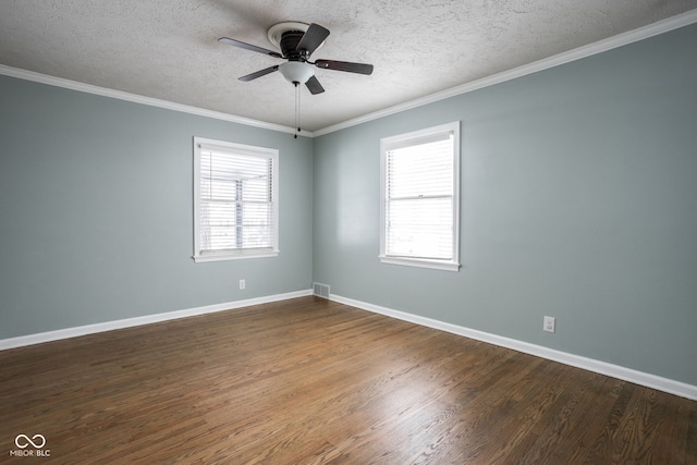 unfurnished room featuring a textured ceiling, ceiling fan, crown molding, and dark wood-type flooring