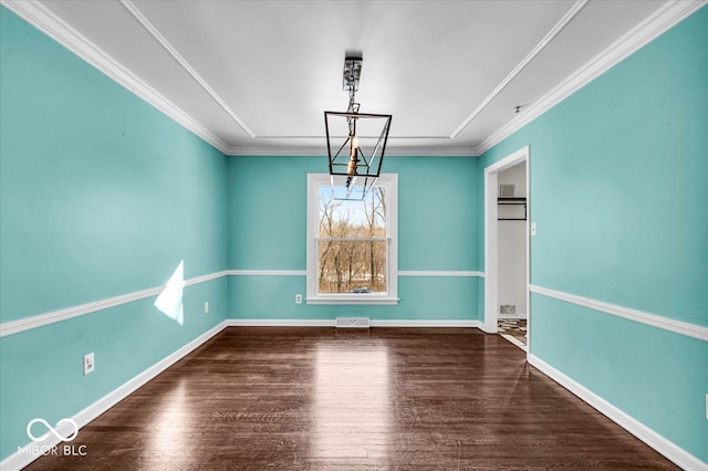 unfurnished dining area featuring crown molding and wood-type flooring