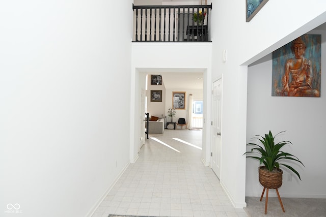 hallway with a towering ceiling