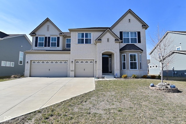 view of front facade with a garage, brick siding, concrete driveway, and a front lawn