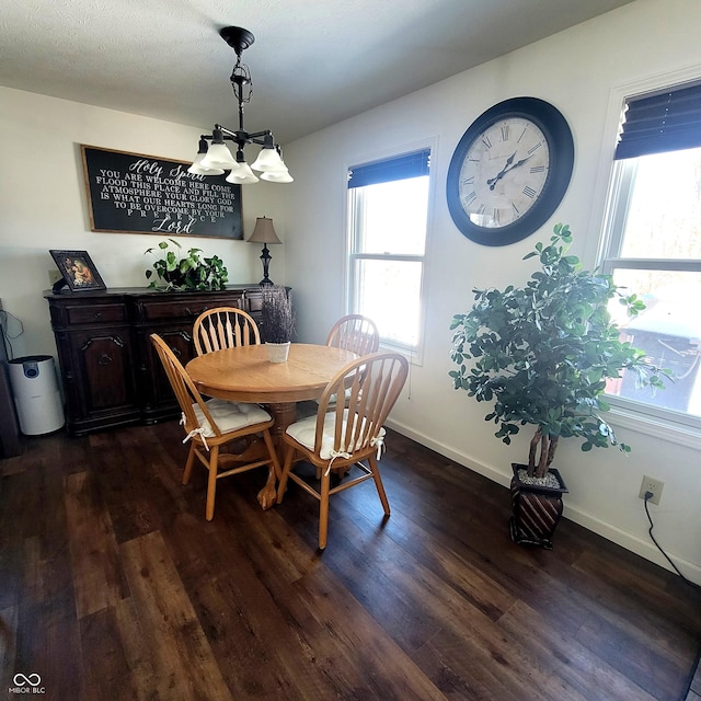 dining space featuring dark hardwood / wood-style flooring