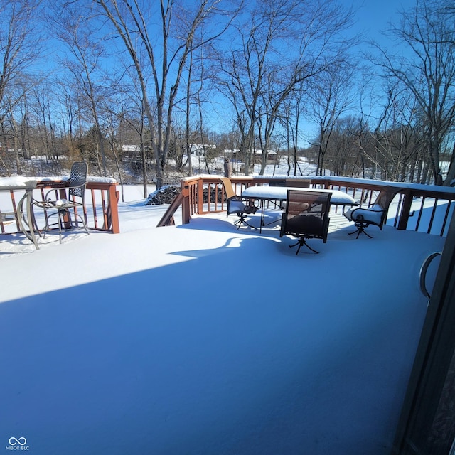 view of snow covered patio