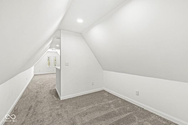 bonus room featuring vaulted ceiling, recessed lighting, baseboards, and carpet floors