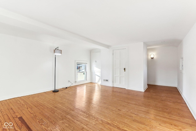 unfurnished room featuring light wood-type flooring