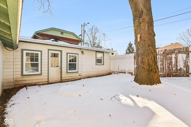 view of yard layered in snow