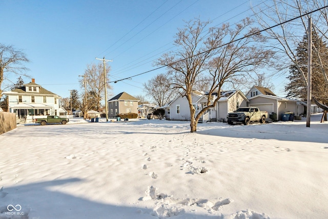 view of yard covered in snow