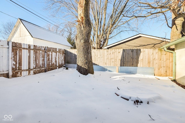 view of yard covered in snow