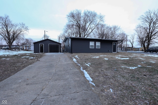 view of front of home with an outbuilding and a garage