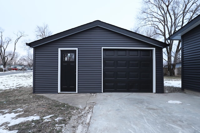 view of snow covered garage