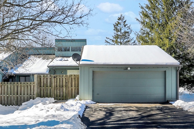 view of snow covered garage