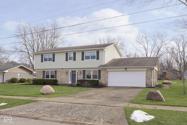 view of front of property with a garage and a front lawn