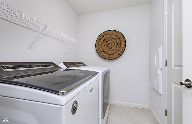 laundry area featuring washing machine and dryer