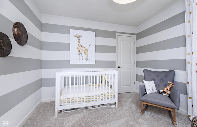 carpeted bedroom with a crib