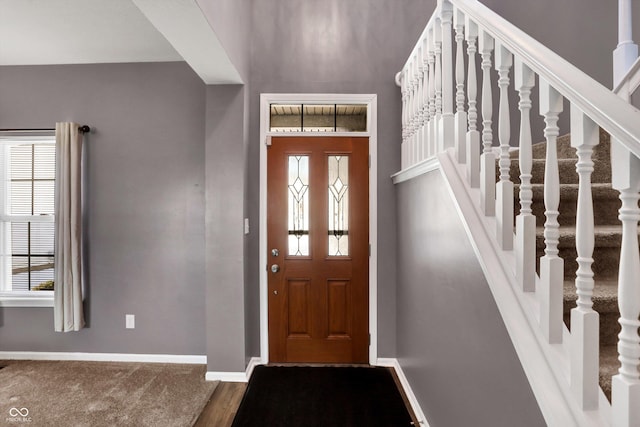 entrance foyer featuring hardwood / wood-style floors and a wealth of natural light