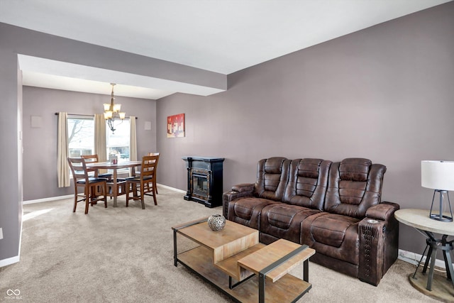 living room with a chandelier and light carpet