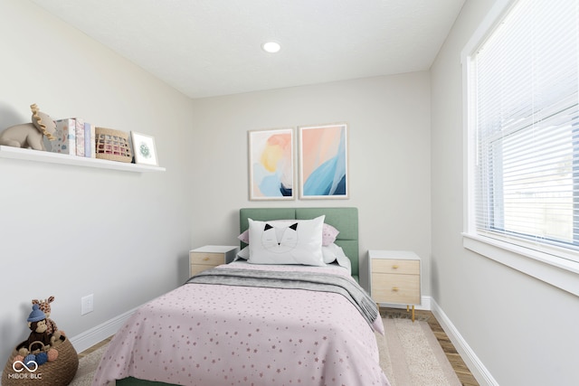 bedroom featuring wood-type flooring