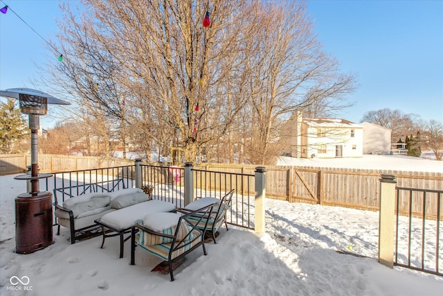 view of snow covered patio