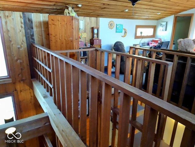 stairs featuring a healthy amount of sunlight and wooden ceiling