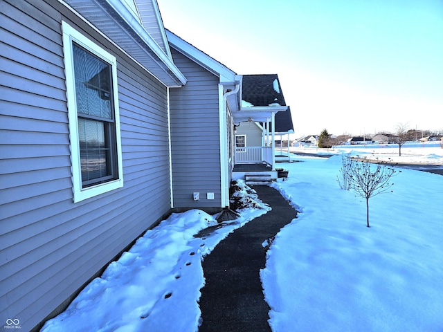 view of yard covered in snow