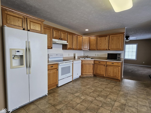 kitchen with white appliances, a textured ceiling, ceiling fan, and sink